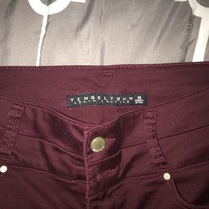 these are a dark maroon pair of jeans I never wear